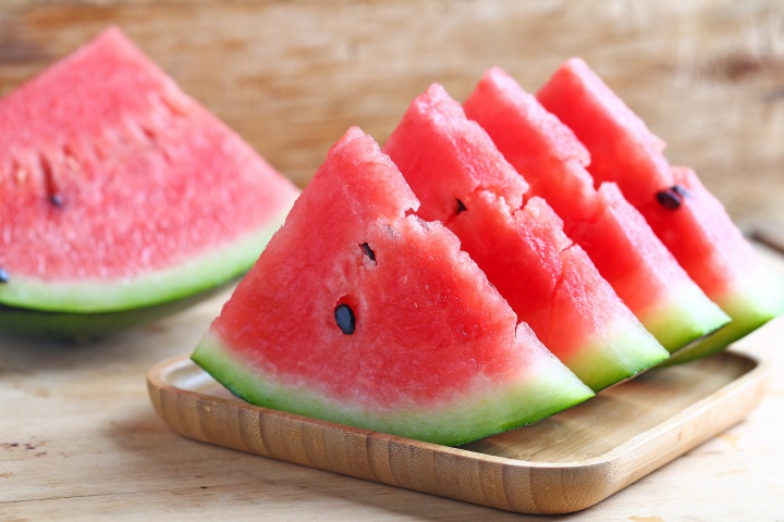 fresh-sliced-watermelon-wooden-background fresh-sliced-watermelon-wooden-background