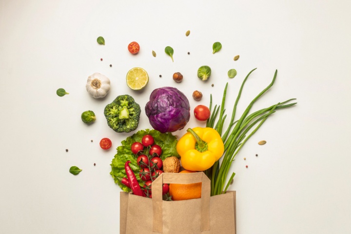top-view-assortment-vegetables-paper-bag